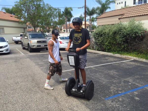 Our Surf City kids channeling their inner "Mall Cop" on Segways from Surf City Segway.