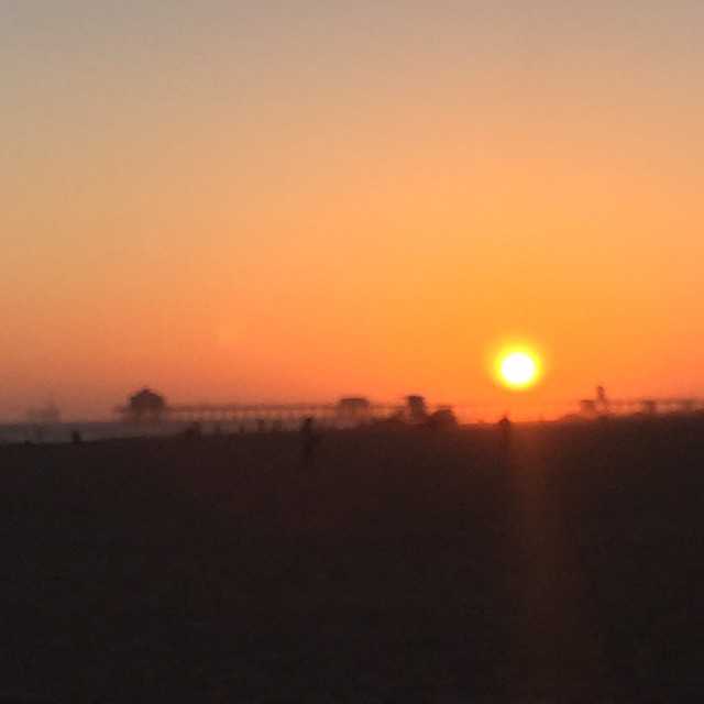 We watched the sun set over the Huntington Beach pier through the haze of many-a-firepit smoke. 